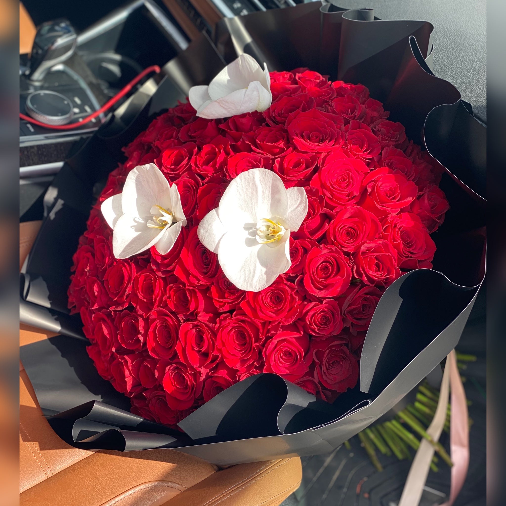 52 Roses Brown Paper Bouquet by West Hollywood Florist